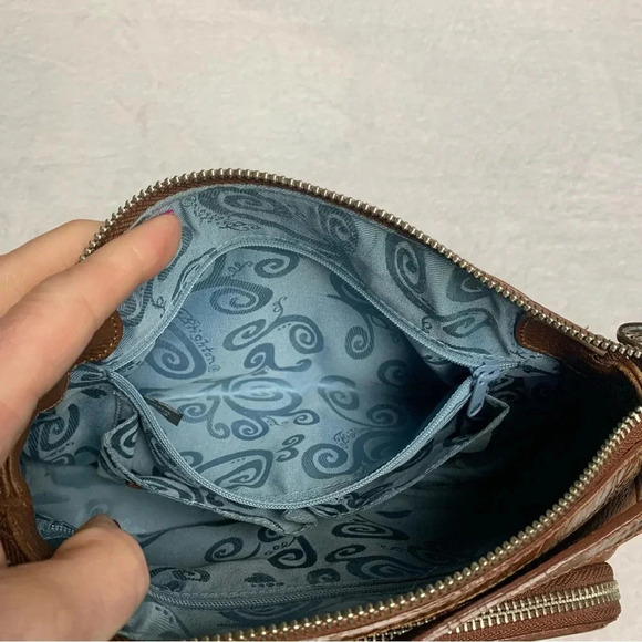 Brighton tan purse with blue patterned interior.  Built in wallet - Picture 5 of 10